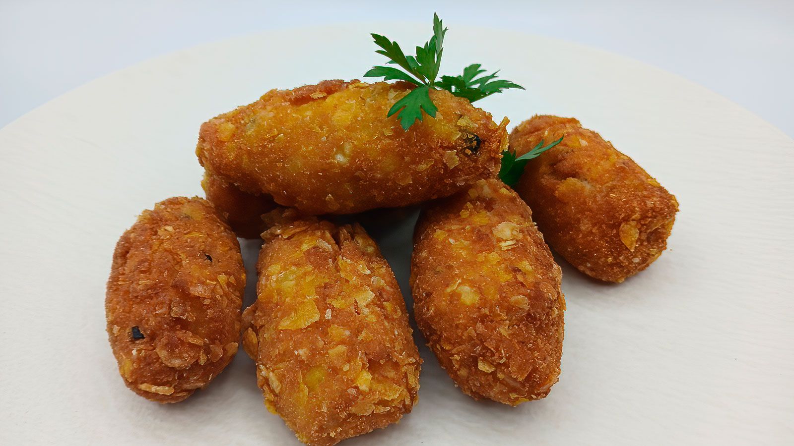 Cómetelo: Croquetas de calabacín, atún y gambas