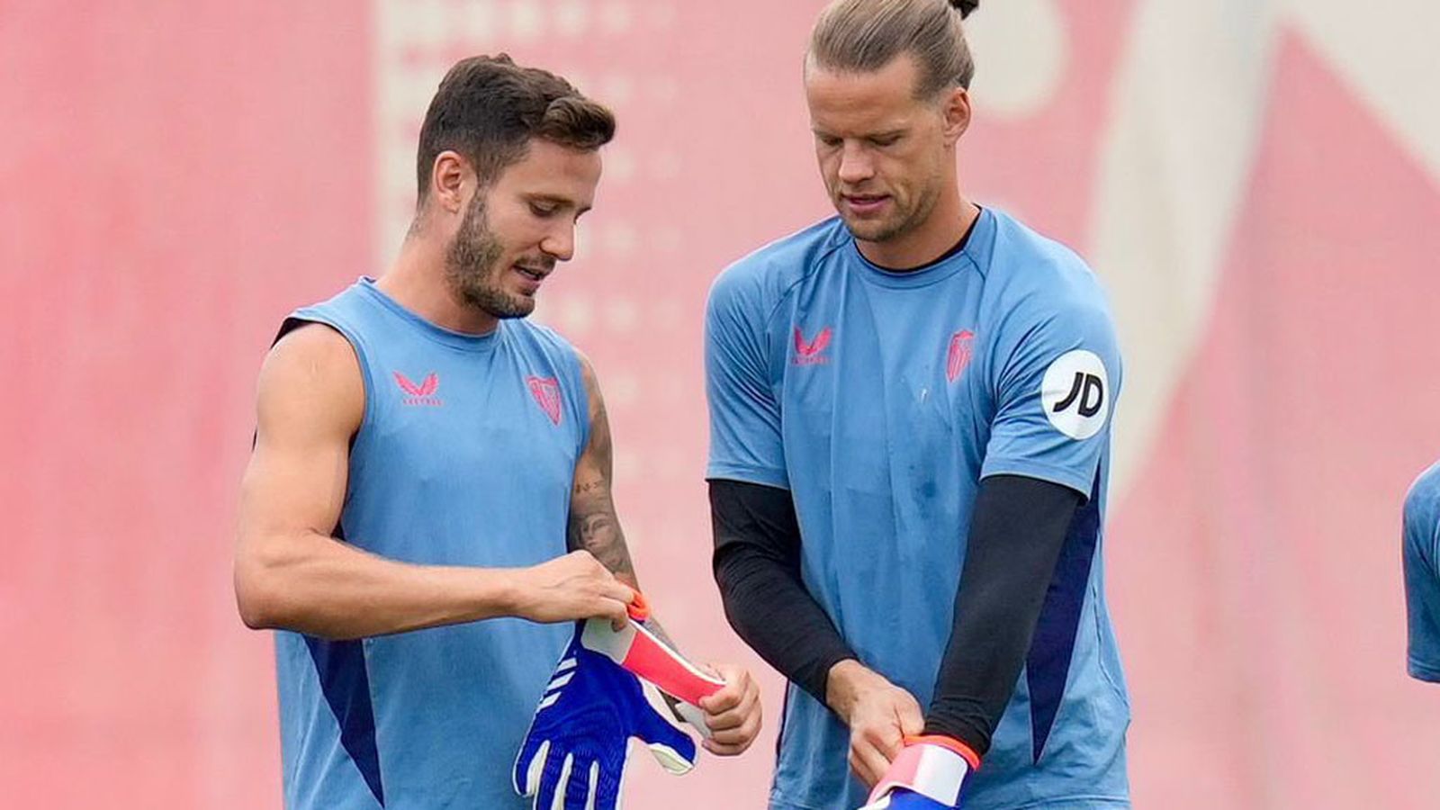Nyland y Saúl Ñíguez, Sevilla