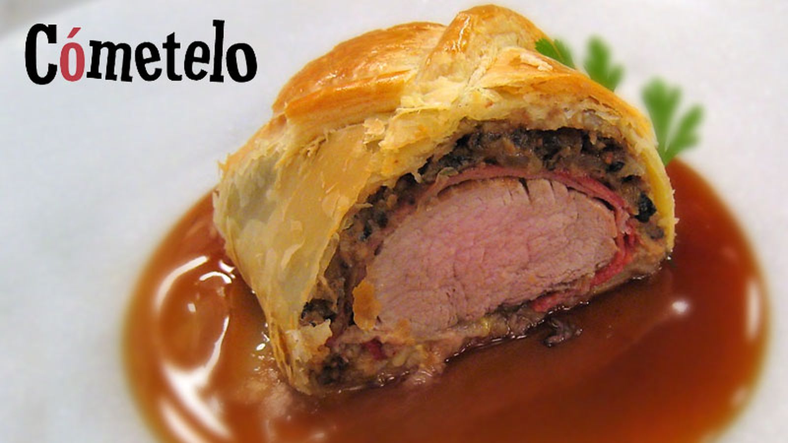 800x450 Cómetelo (Solomillo wellington con logo)