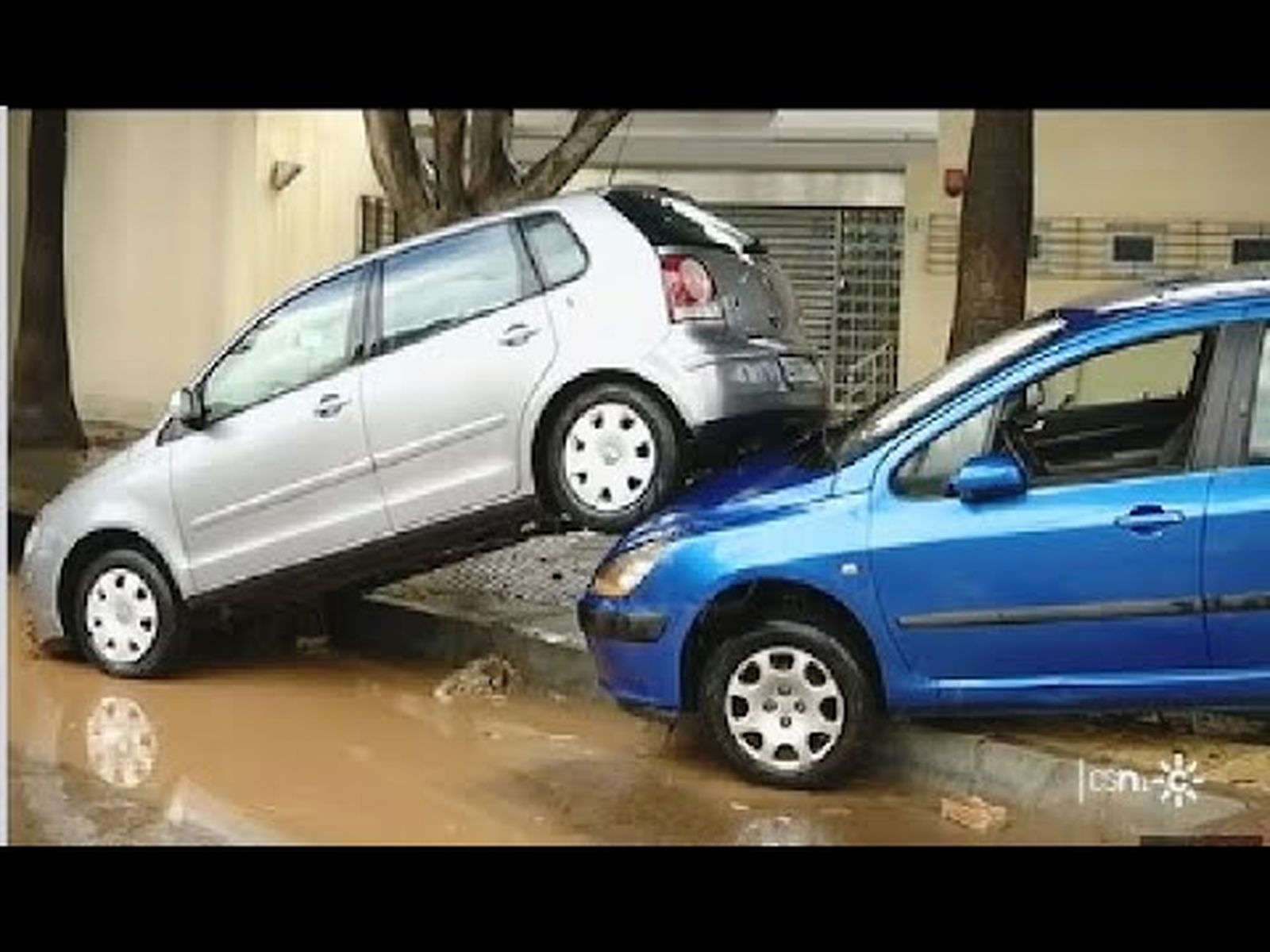 Lluvia torrencial e inundaciones en el barrio malagueño de Campanillas