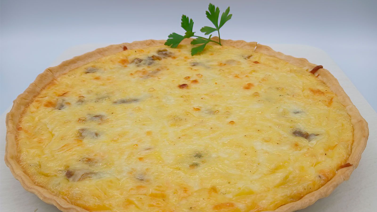 Quiche de queso y fricandó de solomillo