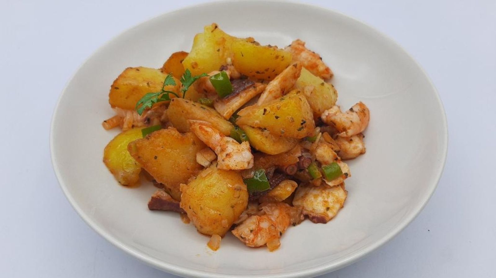 Cómetelo papas aliñadas con pulpo