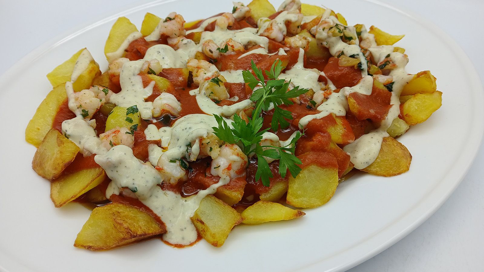 "Cómetelo": Patatas bravas de langostinos