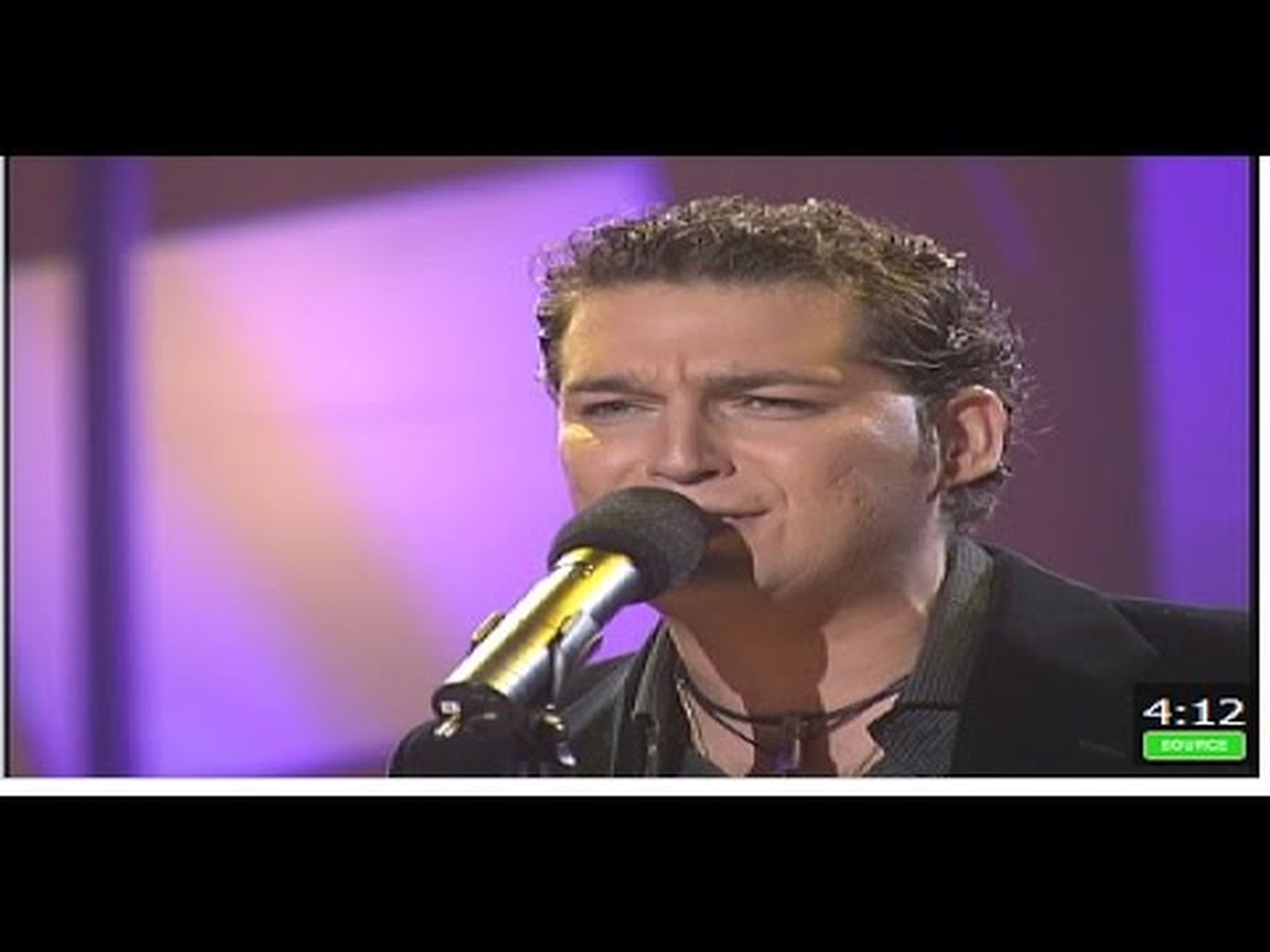 Manu Tenorio: "Una razón para olvidarla" (2003)