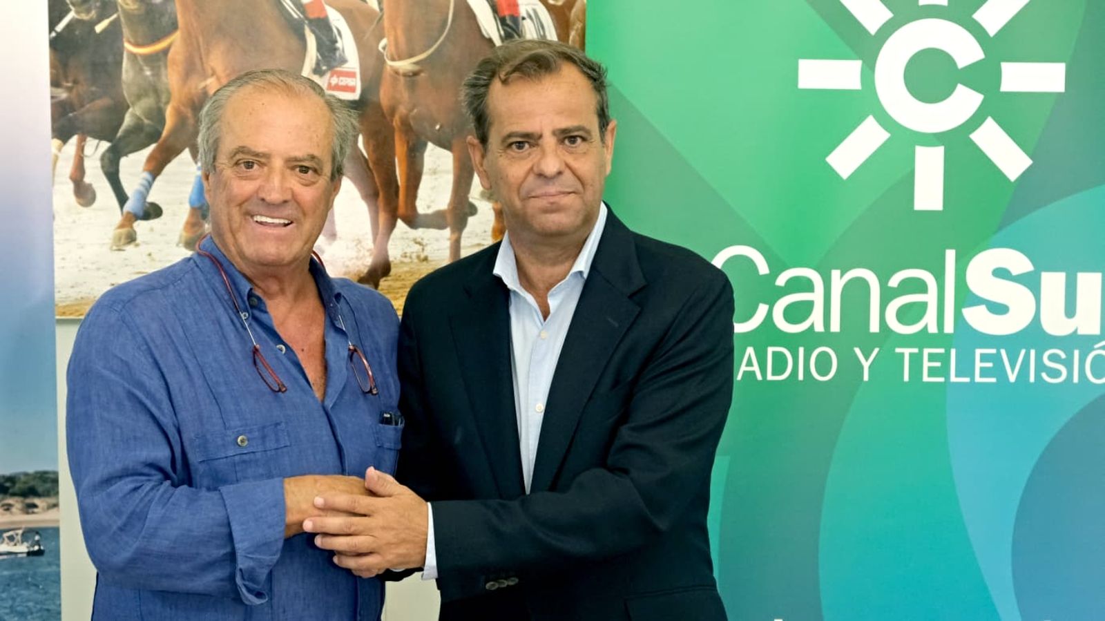 Rafael Hidalgo y Juande Mellado después de la firma del convenio.